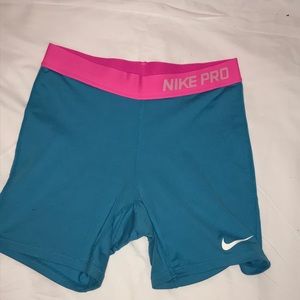 Blue Nike pros with pink band